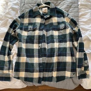 Medium American eagle flannel with cream and green squares and blue line accents